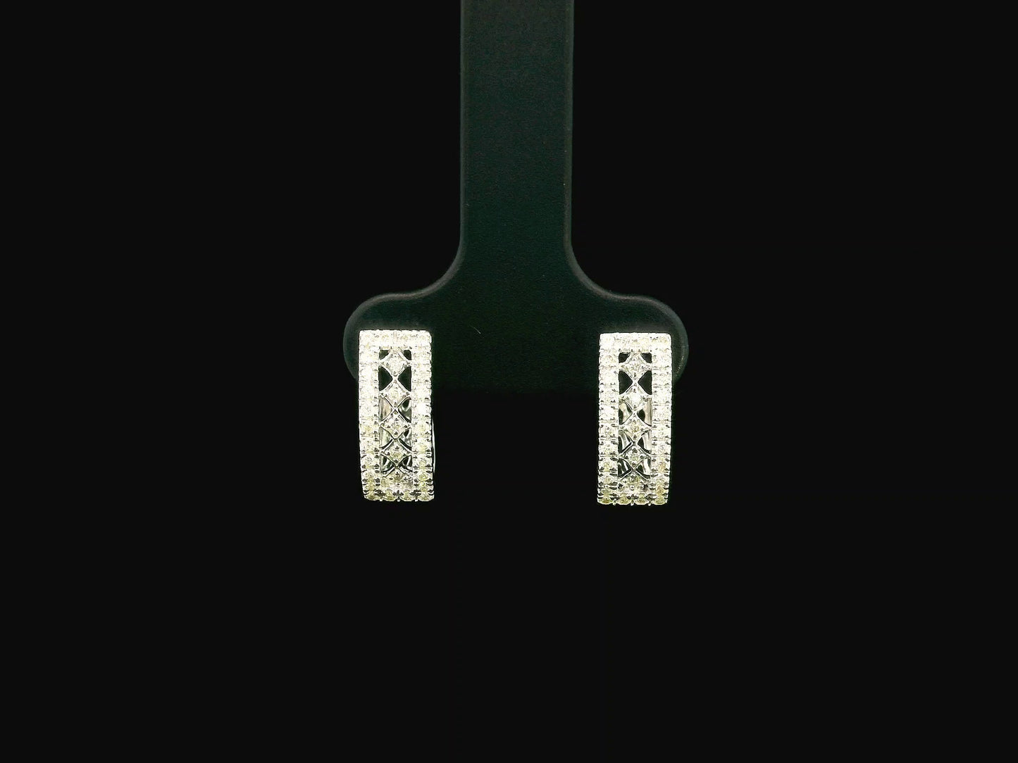 18K white gold diamond hoop earrings featuring 0.30 carat natural diamonds in a modern rectangular hoop design with hinged closures.