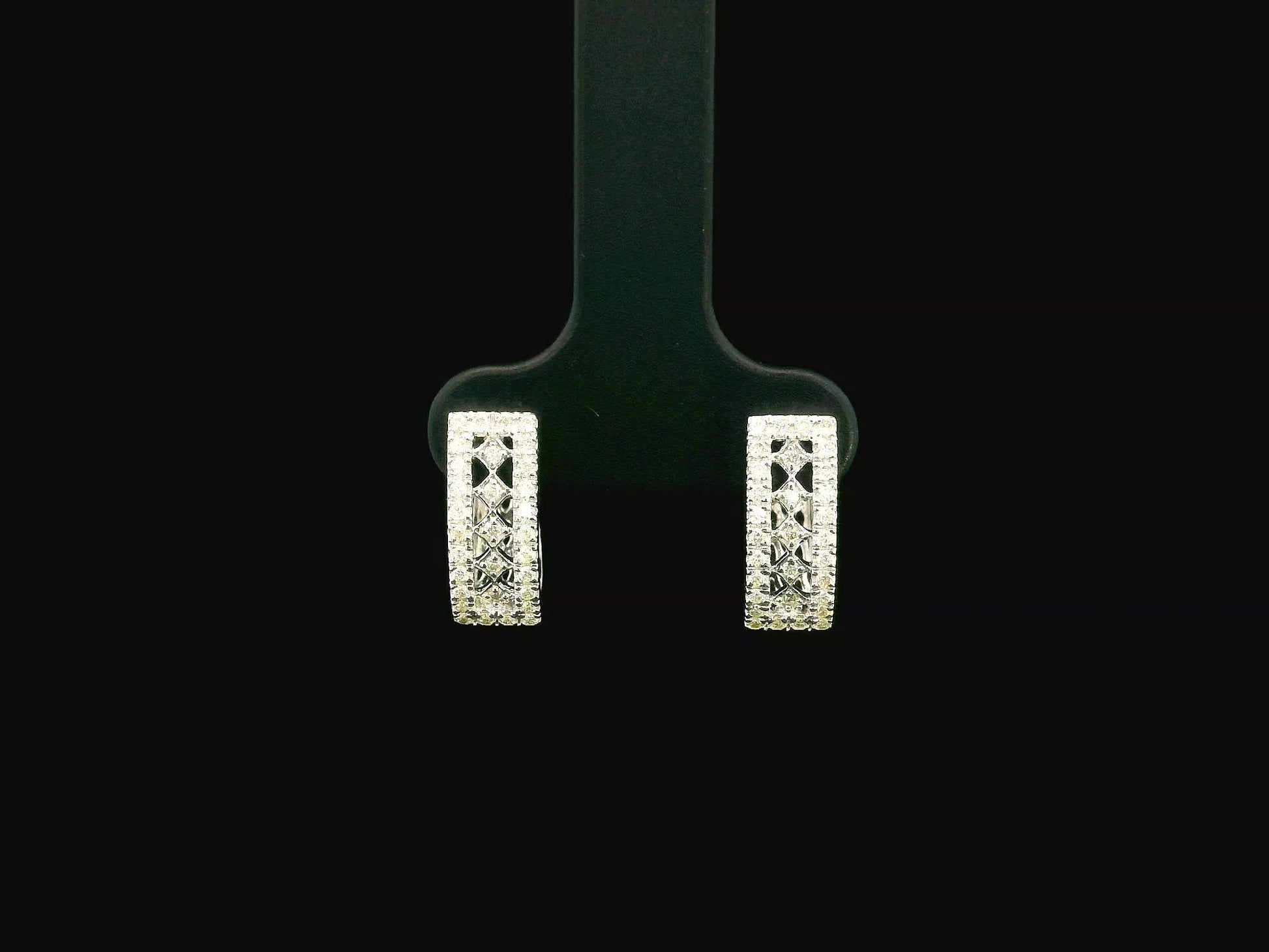 18K white gold diamond hoop earrings featuring 0.30 carat natural diamonds in a modern rectangular hoop design with hinged closures.