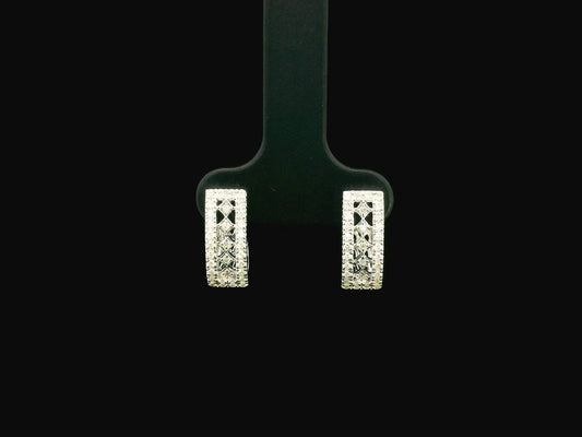 18K white gold diamond hoop earrings featuring 0.30 carat natural diamonds in a modern rectangular hoop design with hinged closures.