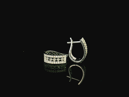 18K white gold diamond hoop earrings featuring 0.30 carat natural diamonds in a modern rectangular hoop design with hinged closures.