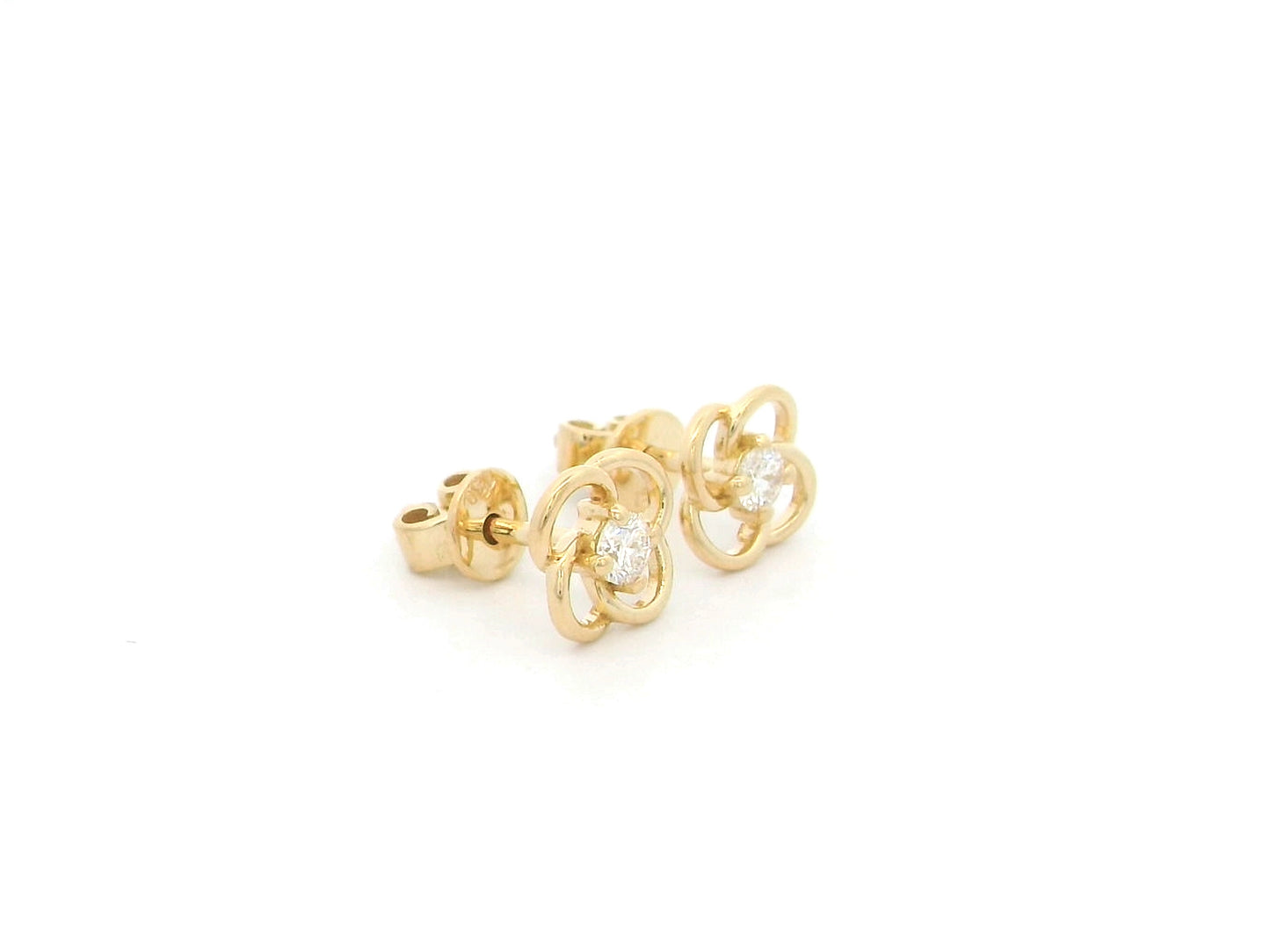 18K yellow gold diamond flower stud earrings featuring an open floral design with 0.19 carats of natural round brilliant diamonds and secure butterfly backs.
