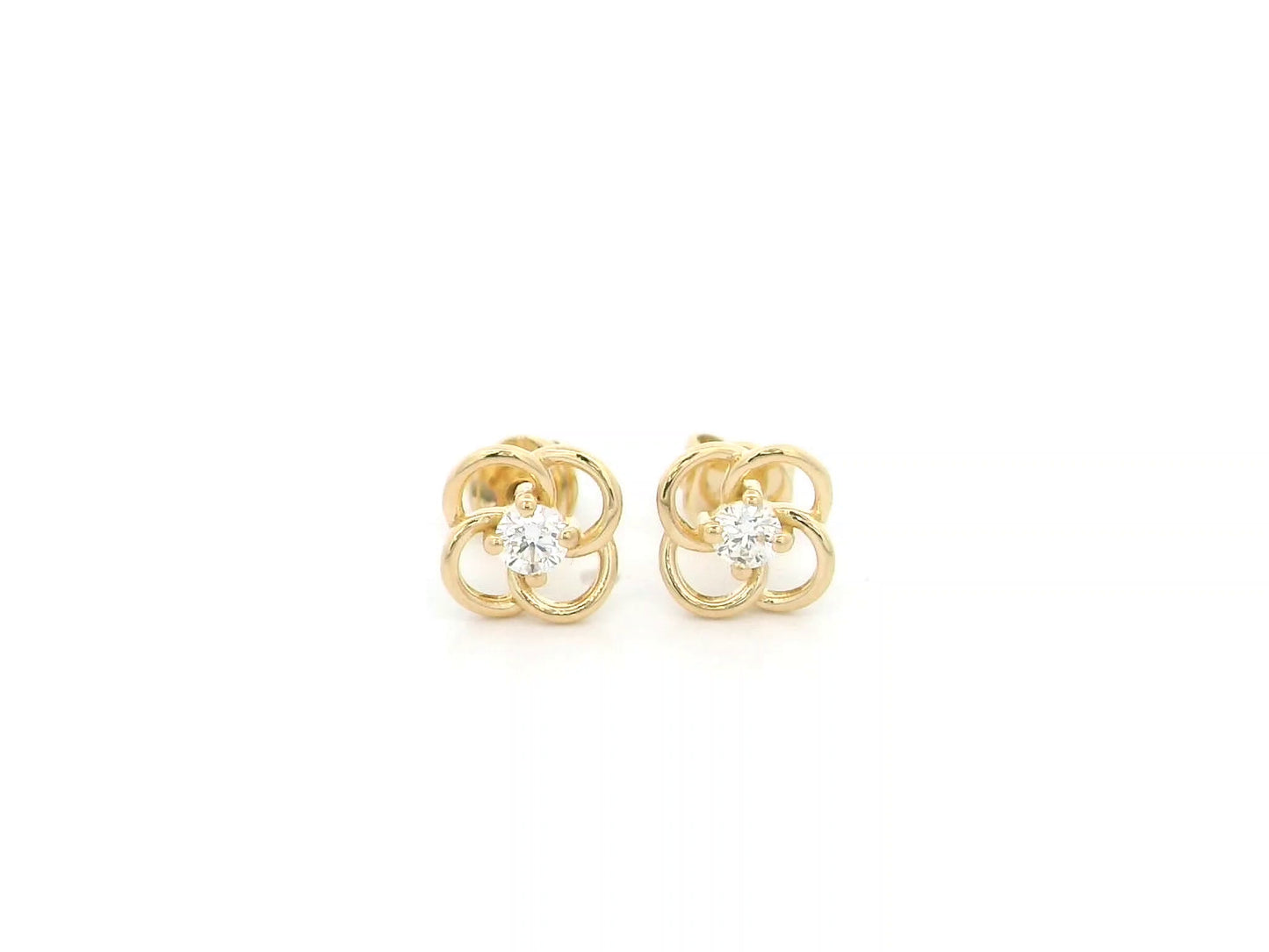 18K yellow gold diamond flower stud earrings featuring an open floral design with 0.19 carats of natural round brilliant diamonds and secure butterfly backs.