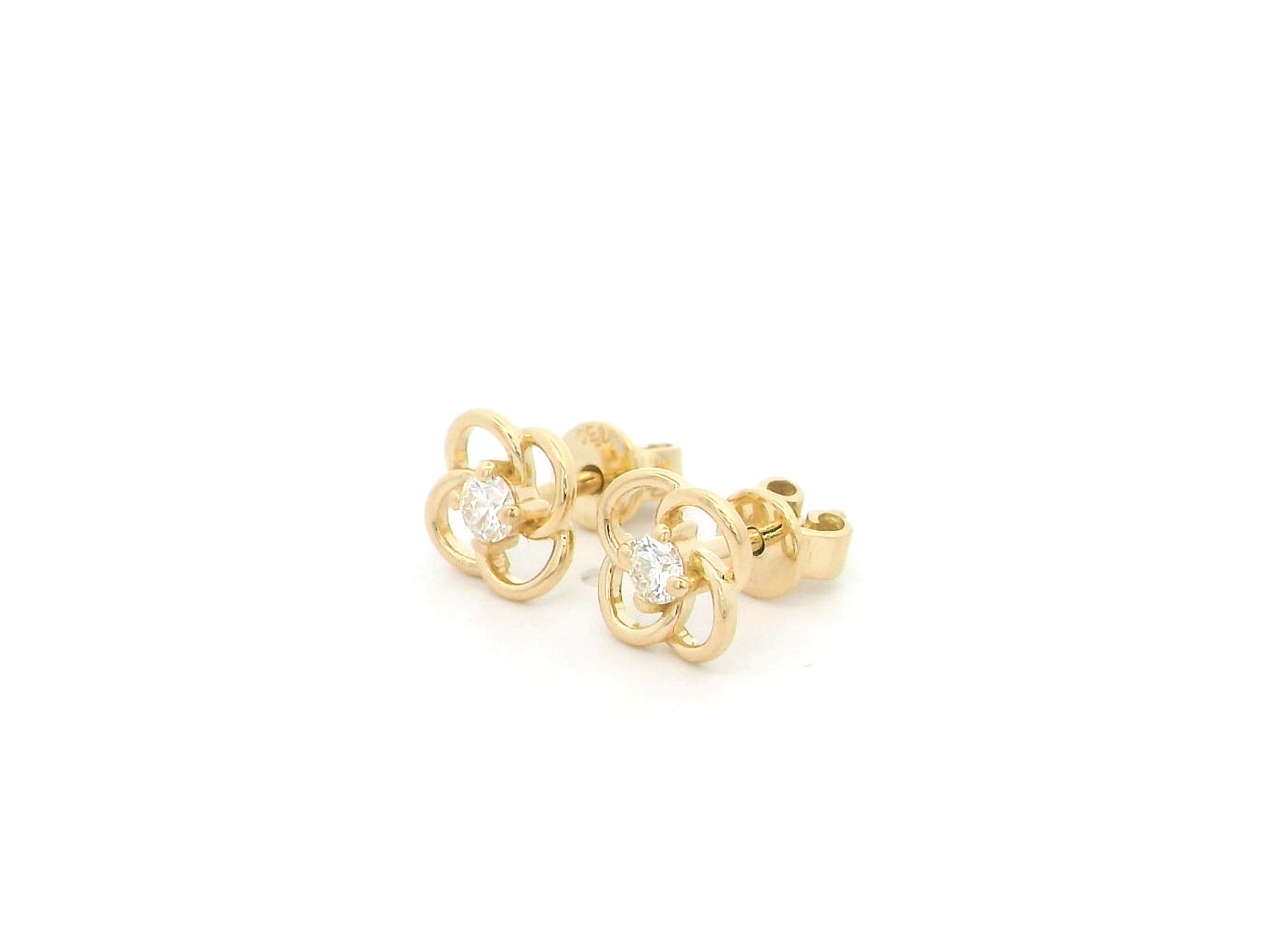 18K yellow gold diamond flower stud earrings featuring an open floral design with 0.19 carats of natural round brilliant diamonds and secure butterfly backs.
