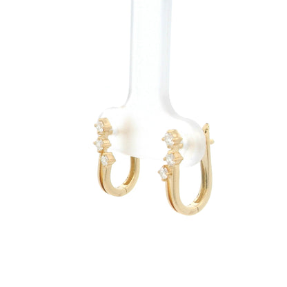 18K Yellow Gold Diamond Hoop Earrings featuring three natural diamonds on each hoop with a modern double-row huggie design.