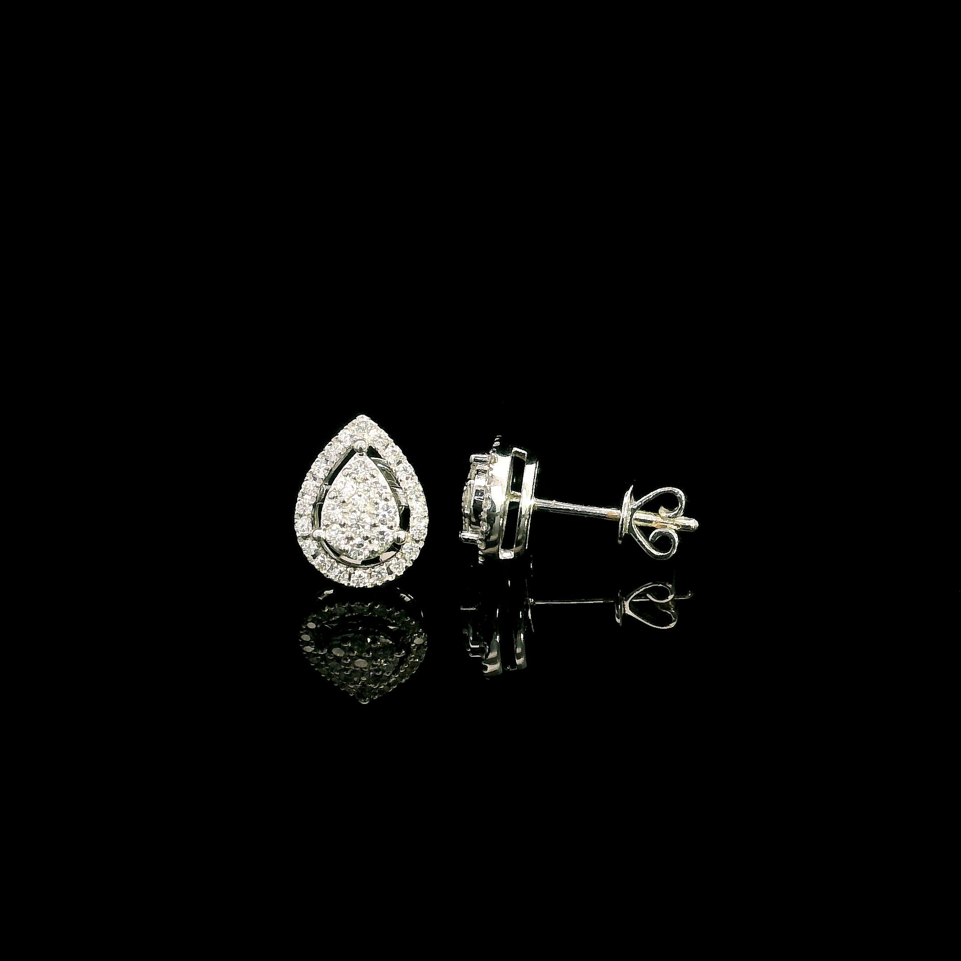 18K white gold diamond stud earrings featuring a pear-shaped cluster of natural diamonds surrounded by a sparkling diamond halo.