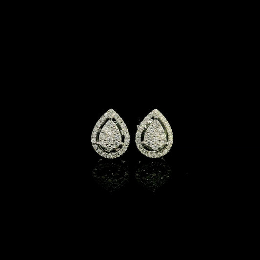 18K white gold diamond stud earrings featuring a pear-shaped cluster of natural diamonds surrounded by a sparkling diamond halo.