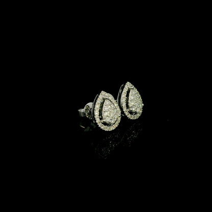 18K white gold diamond stud earrings featuring a pear-shaped cluster of natural diamonds surrounded by a sparkling diamond halo.