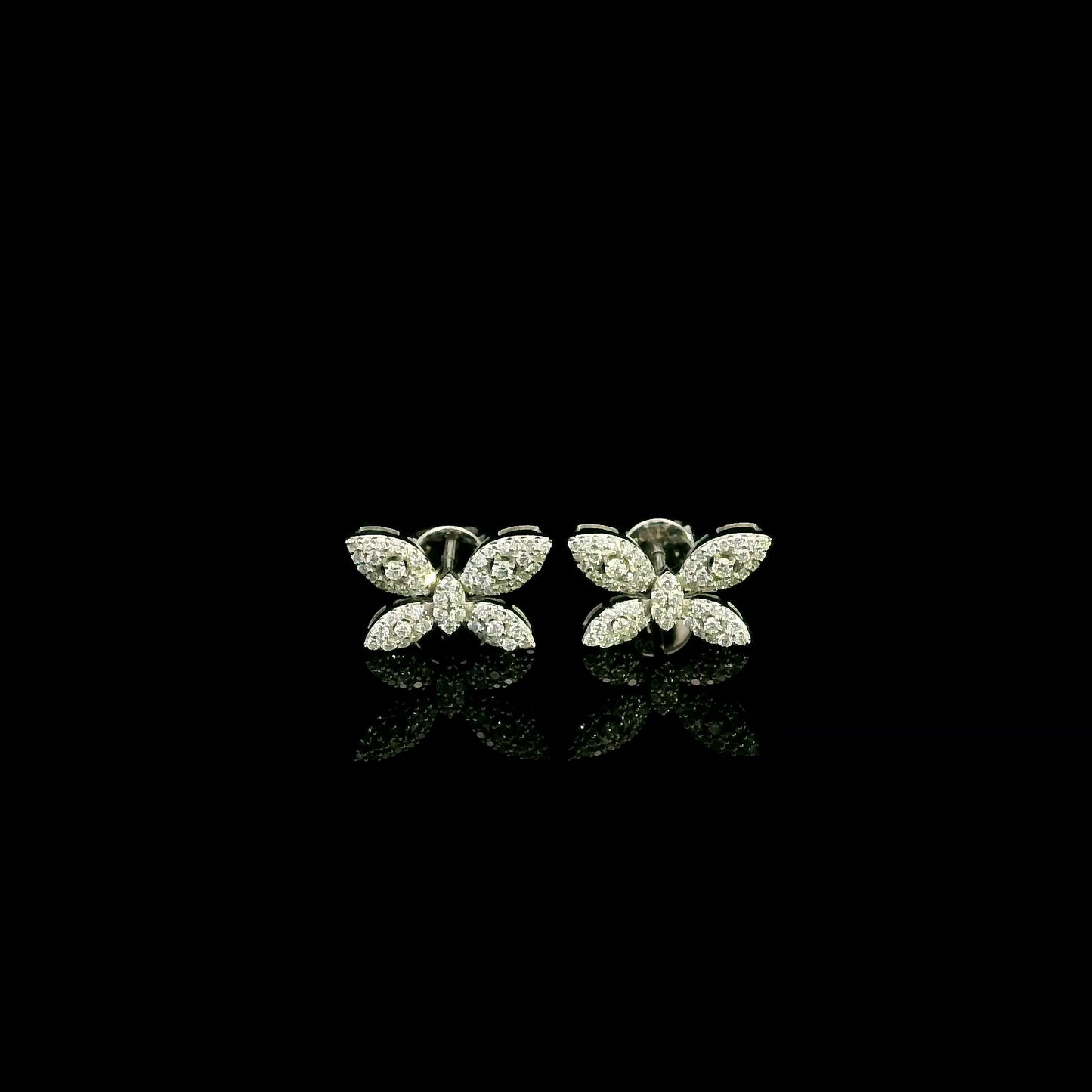 18K white gold butterfly stud earrings featuring 0.45 carat natural round brilliant diamonds in a pavé setting with secure butterfly backs.