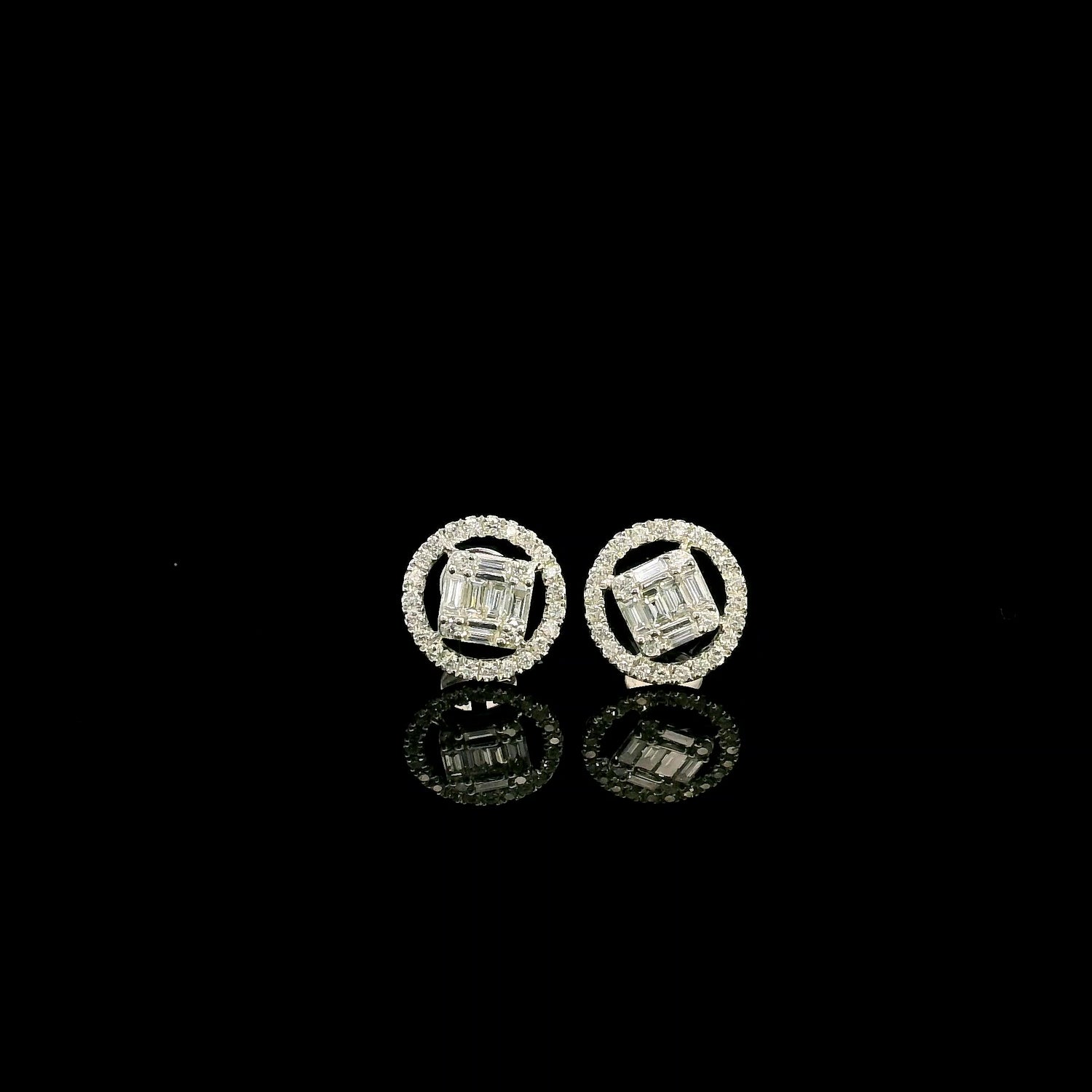 18K white gold emerald cut illusion diamond stud earrings featuring round and baguette natural diamonds with a sparkling round diamond halo and secure butterfly backs.