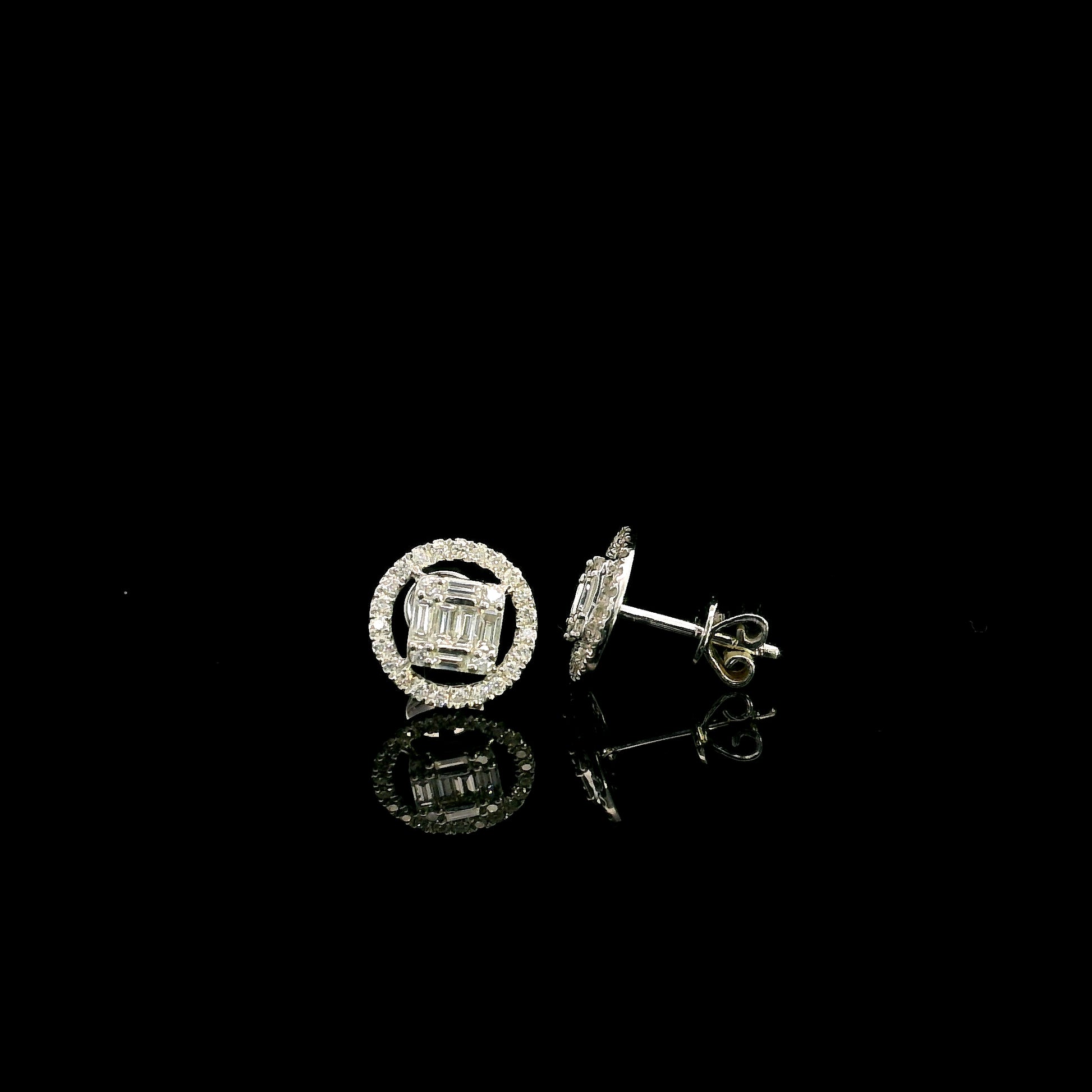 18K white gold emerald cut illusion diamond stud earrings featuring round and baguette natural diamonds with a sparkling round diamond halo and secure butterfly backs.