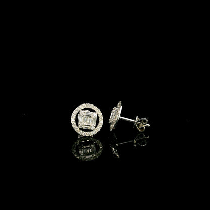 18K white gold emerald cut illusion diamond stud earrings featuring round and baguette natural diamonds with a sparkling round diamond halo and secure butterfly backs.