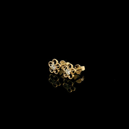 18K yellow gold flower diamond stud earrings featuring round brilliant natural diamonds in a delicate open floral design.