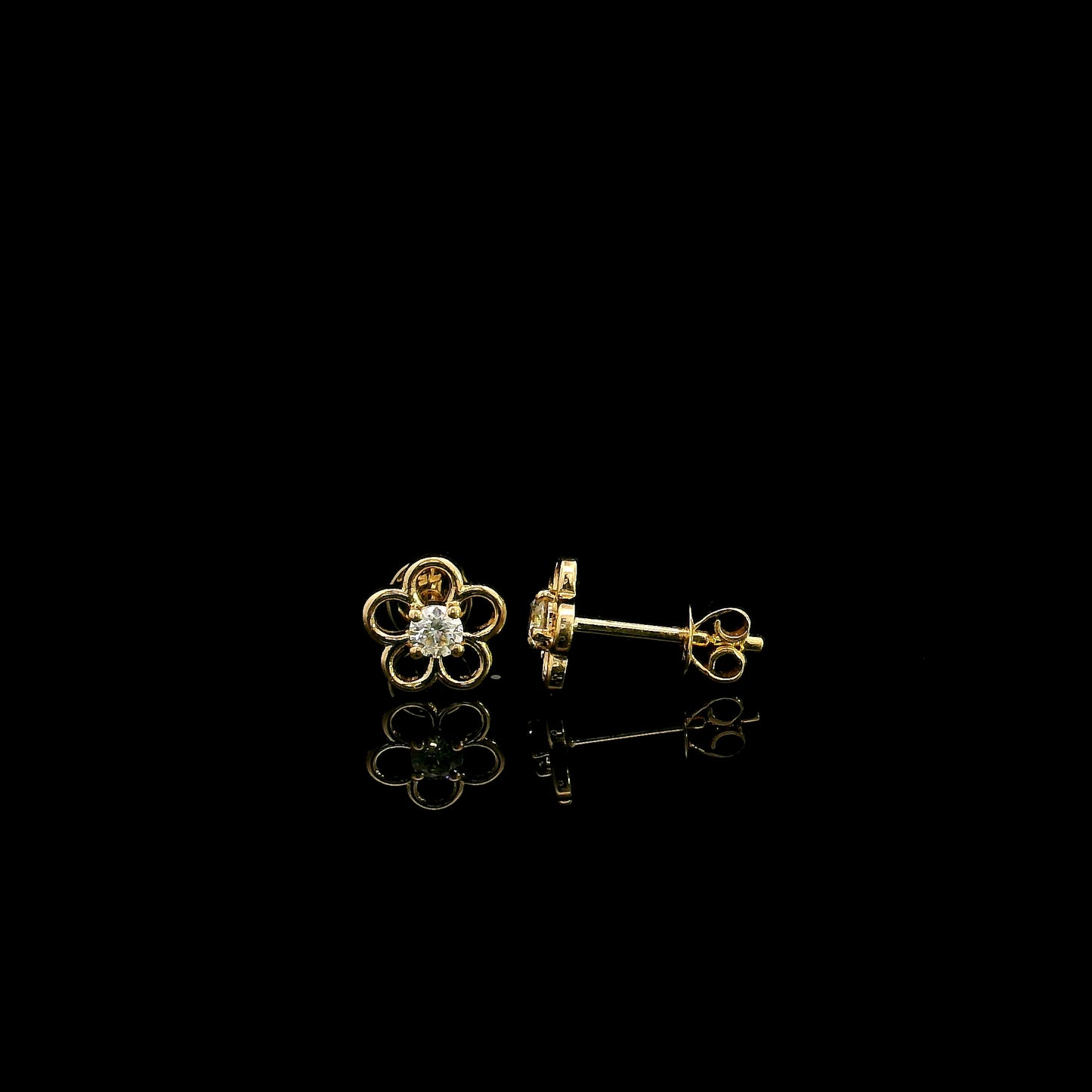 18K yellow gold flower diamond stud earrings featuring round brilliant natural diamonds in a delicate open floral design.