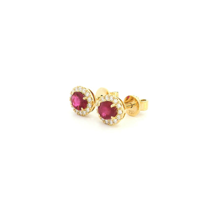 18K yellow gold natural ruby diamond halo stud earrings featuring round rubies surrounded by brilliant natural diamonds.