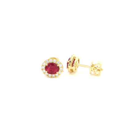 18K yellow gold natural ruby diamond halo stud earrings featuring round rubies surrounded by brilliant natural diamonds.