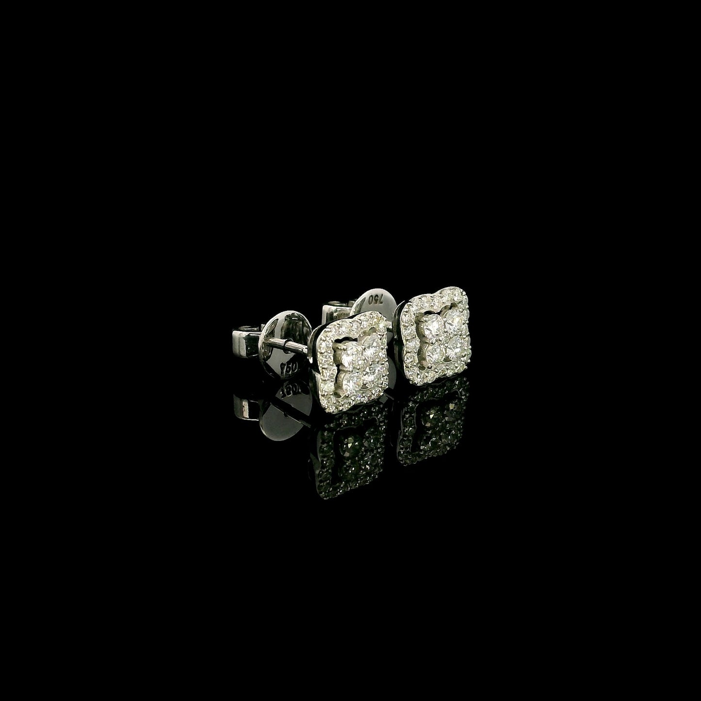 18K white gold cushion halo diamond stud earrings featuring 0.44 carat natural round brilliant diamonds in a sparkling cluster design with secure butterfly backs.