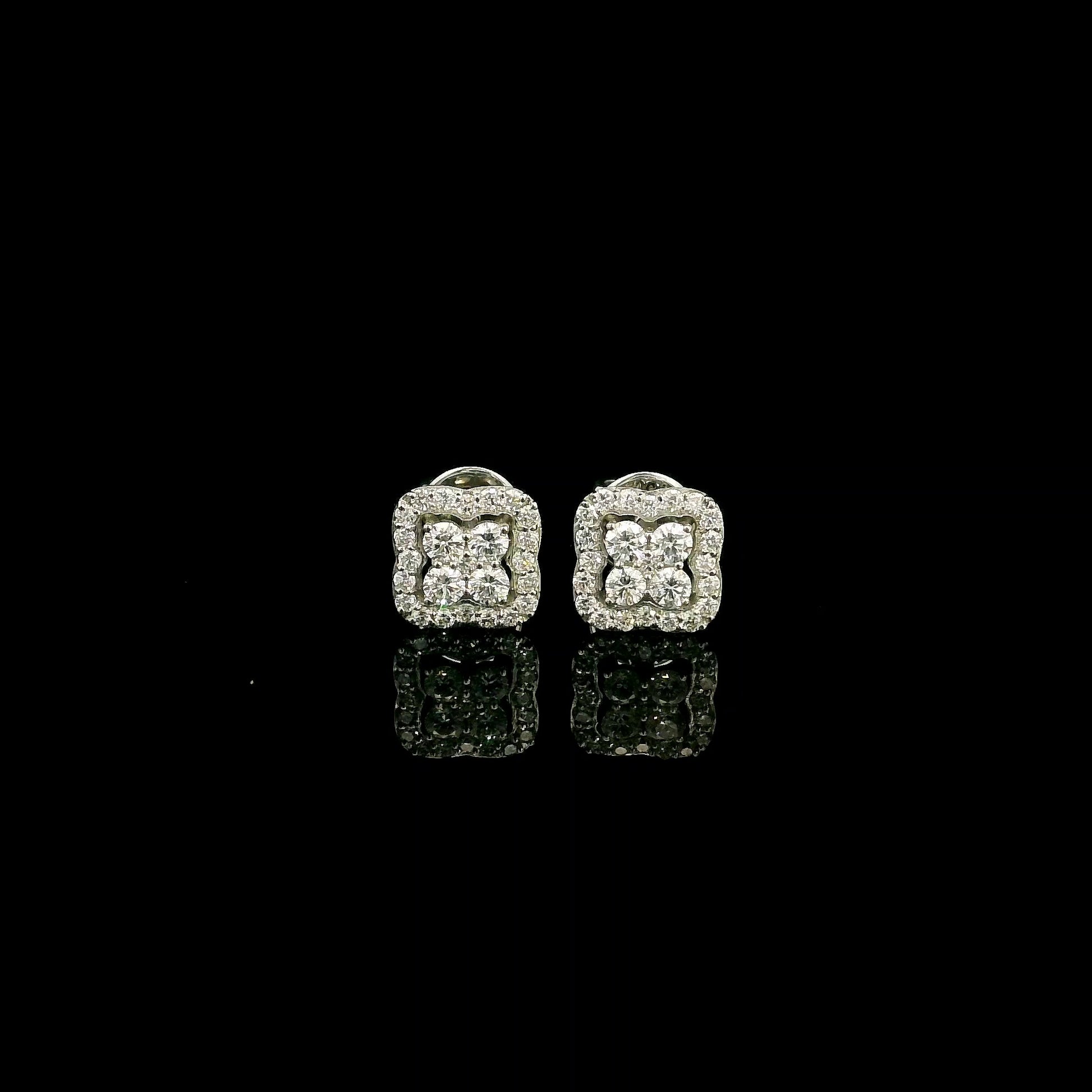 18K white gold cushion halo diamond stud earrings featuring 0.44 carat natural round brilliant diamonds in a sparkling cluster design with secure butterfly backs.
