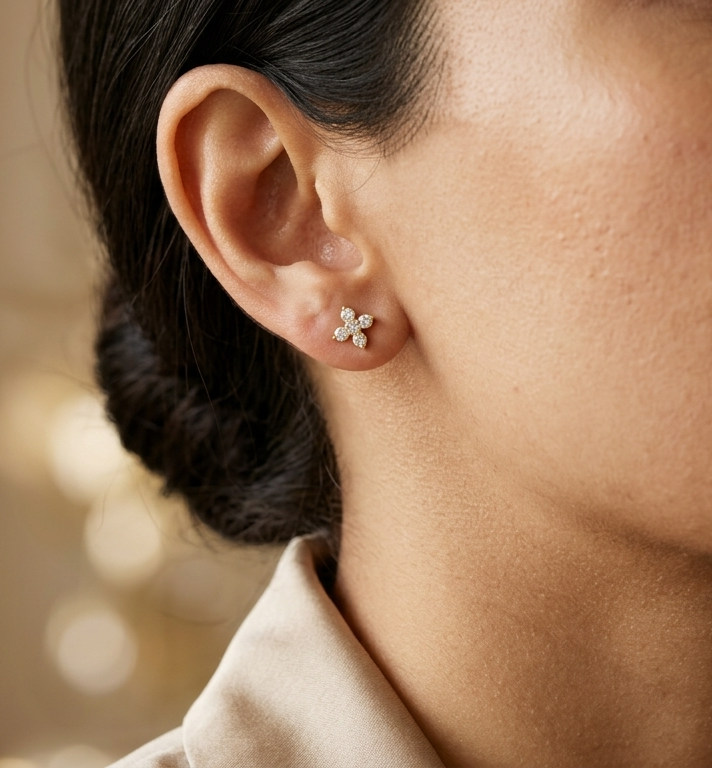 18K Yellow Gold Diamond Stud Earrings featuring a five round brilliant diamond cluster with a total diamond weight of 0.32 carat.