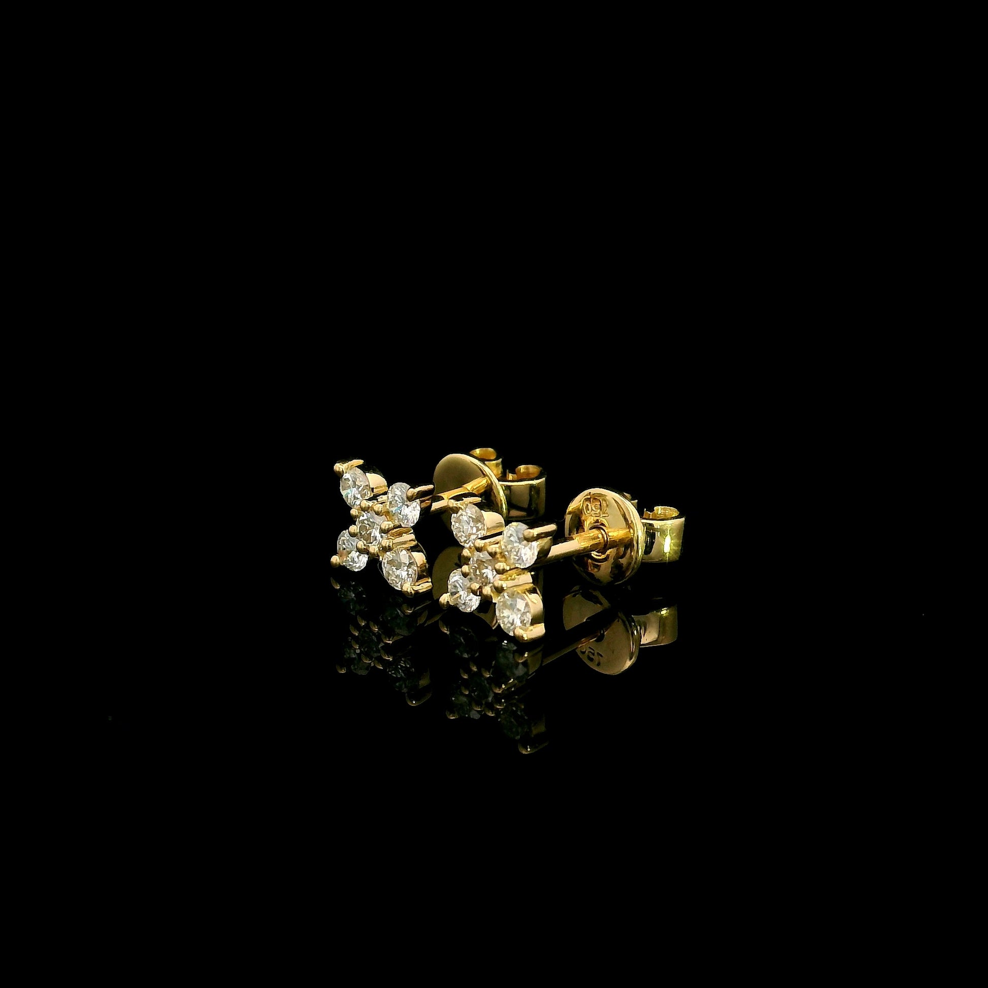 18K Yellow Gold Diamond Stud Earrings featuring a five round brilliant diamond cluster with a total diamond weight of 0.32 carat.
