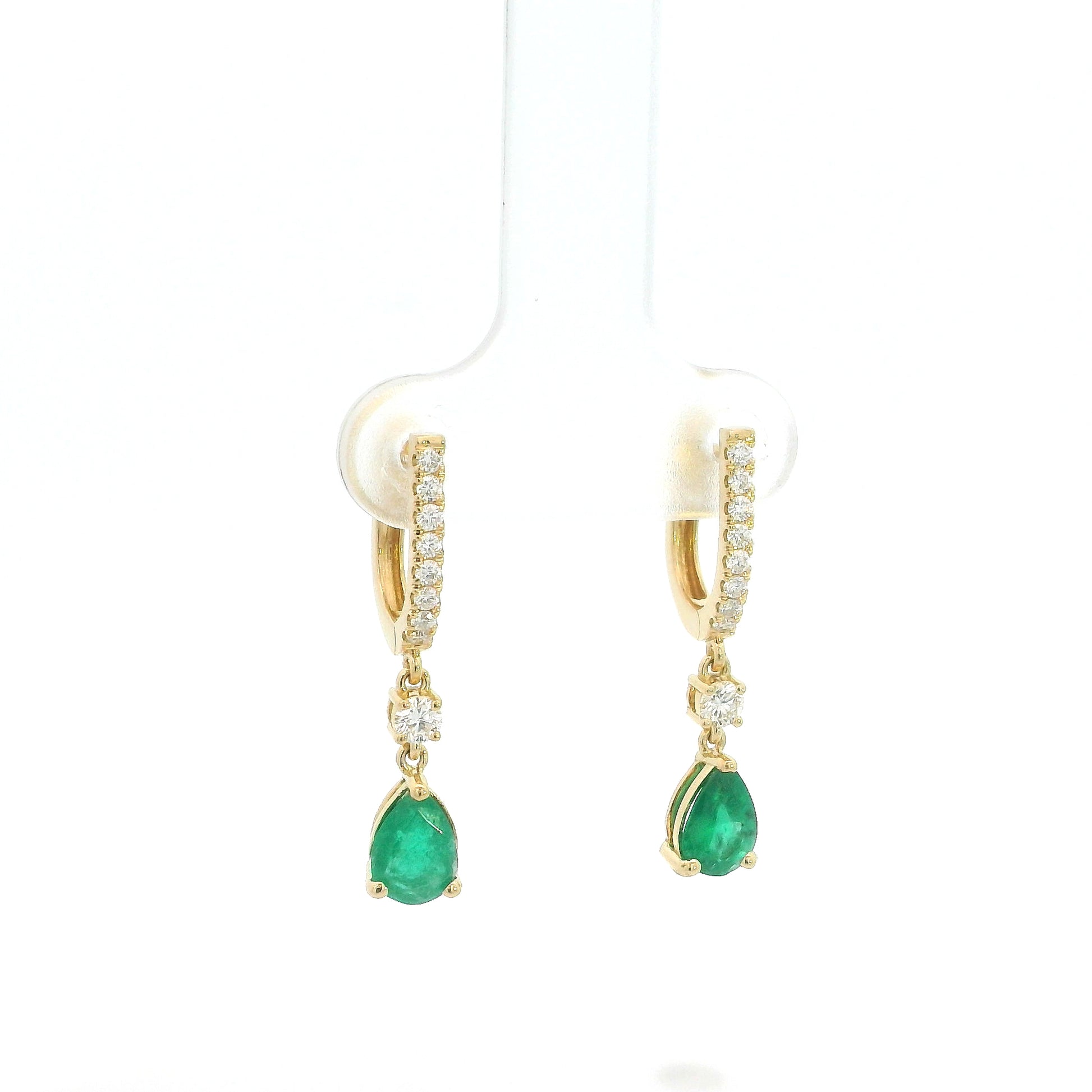 18K Yellow Gold Emerald Drop Earrings featuring 1.00 carat natural pear-shaped emeralds suspended from diamond huggie hoops with 0.31 carat natural diamonds.