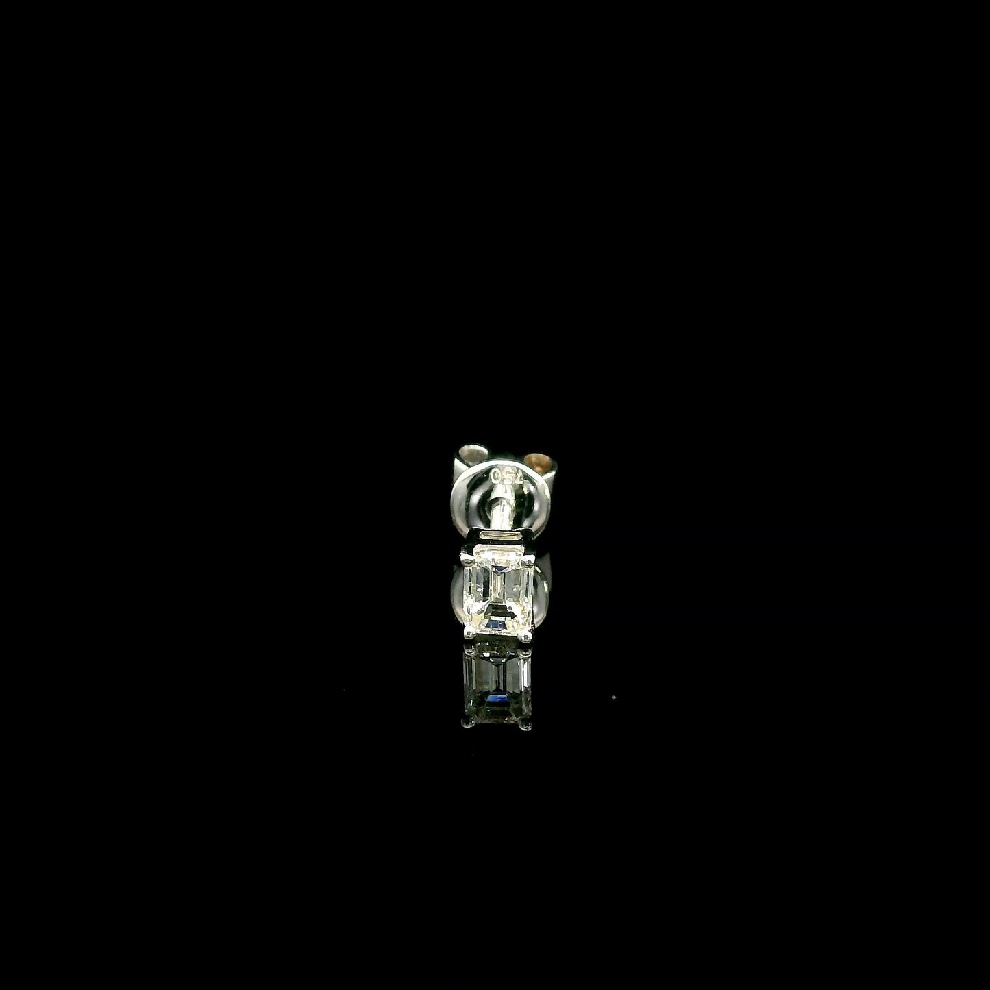 Emerald cut diamond single stud earring in 18K white gold with 0.25 carat natural diamond