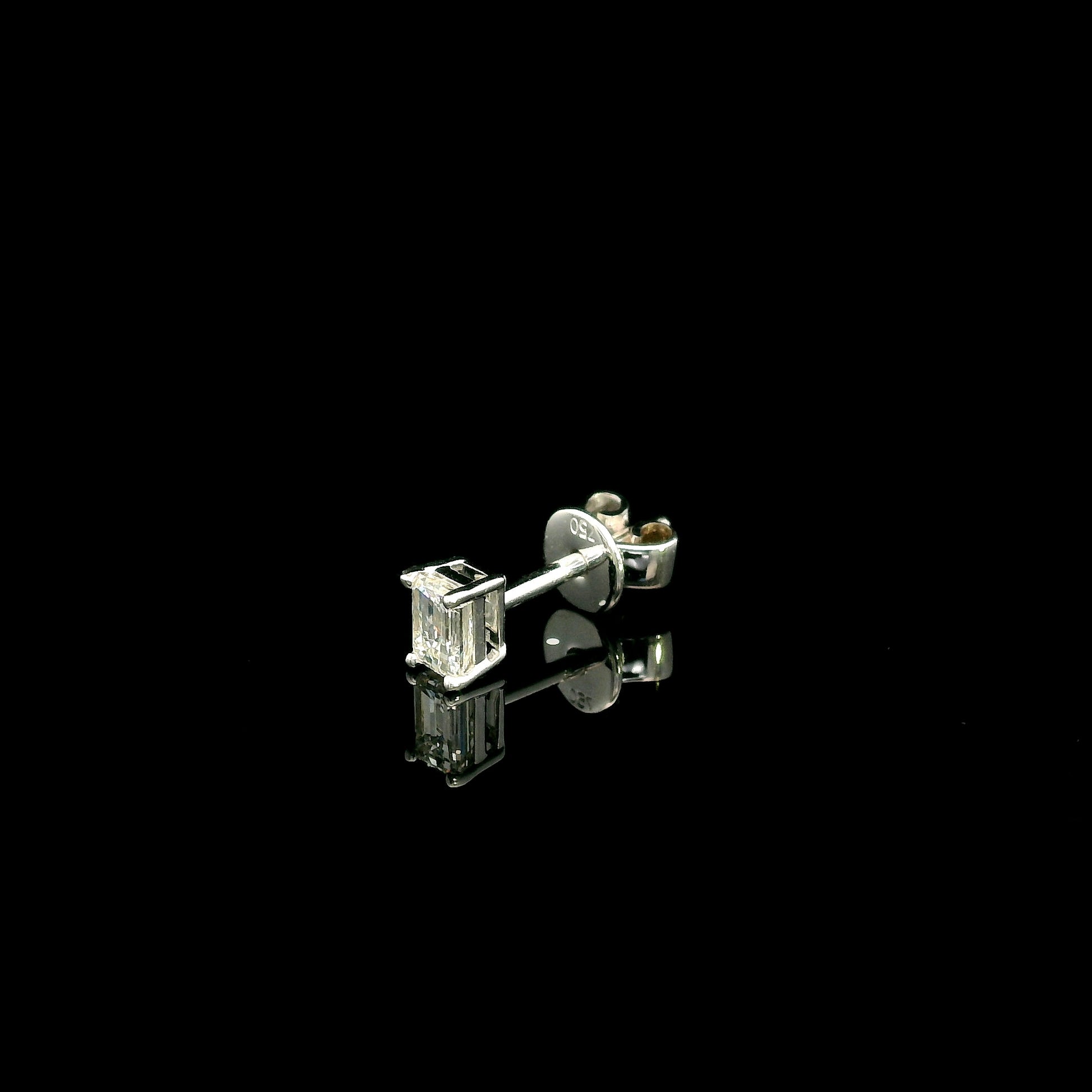 Emerald cut diamond single stud earring in 18K white gold with 0.25 carat natural diamond