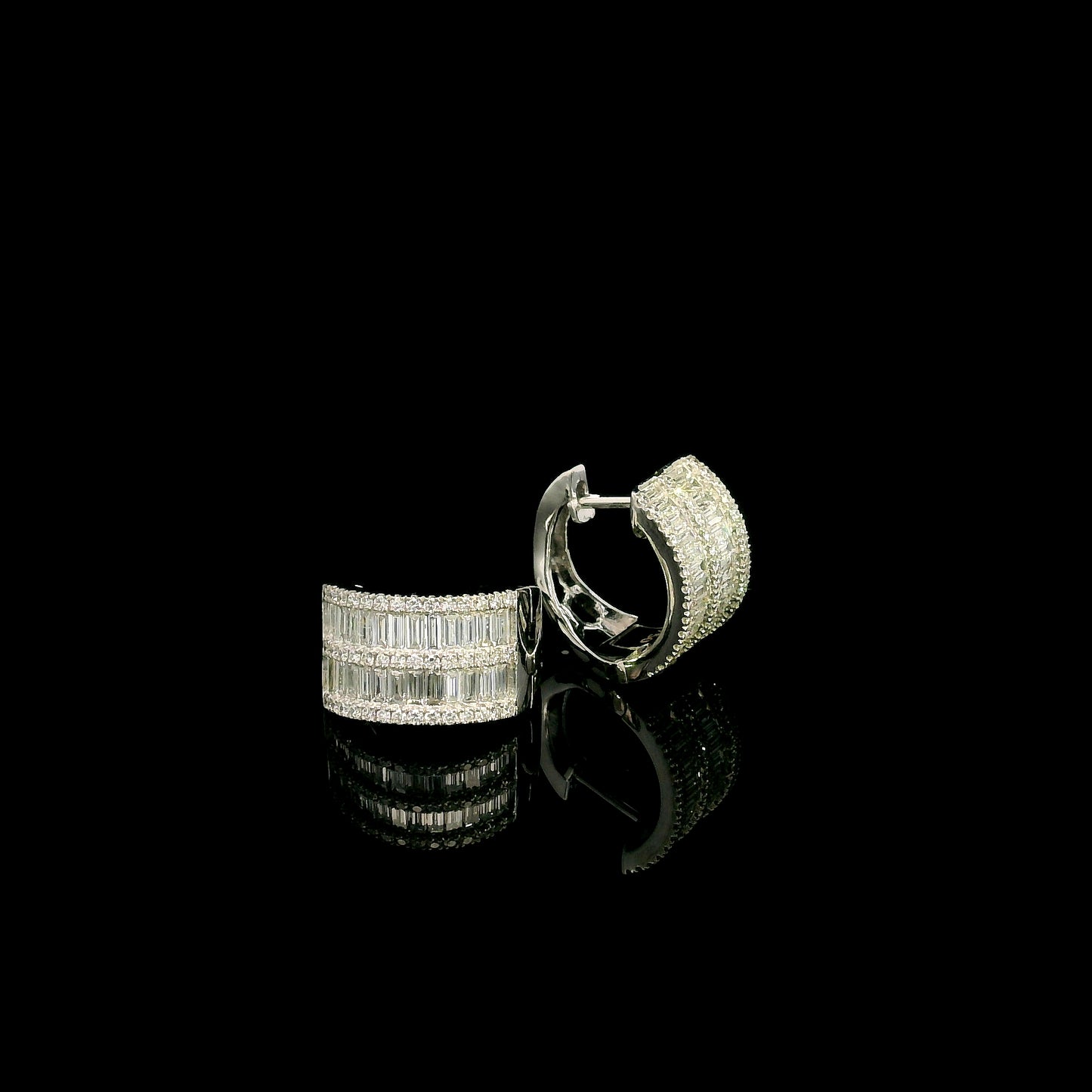 18K white gold baguette and round diamond huggie hoop earrings with multi-row diamond design