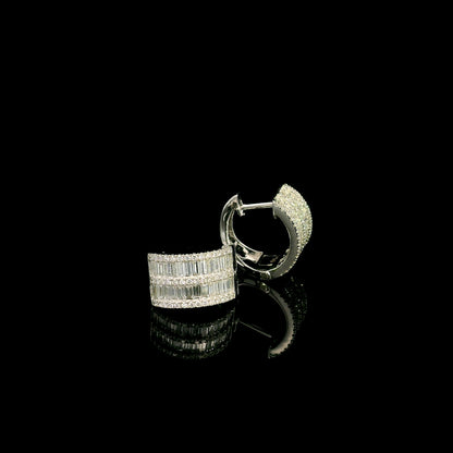 18K white gold baguette and round diamond huggie hoop earrings with multi-row diamond design