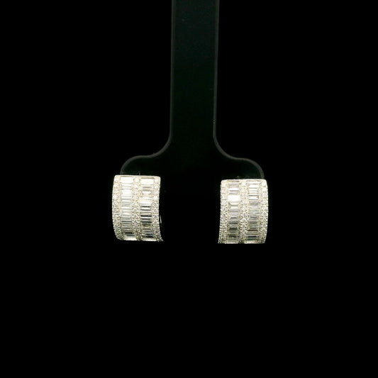 18K white gold baguette and round diamond huggie hoop earrings with multi-row diamond design