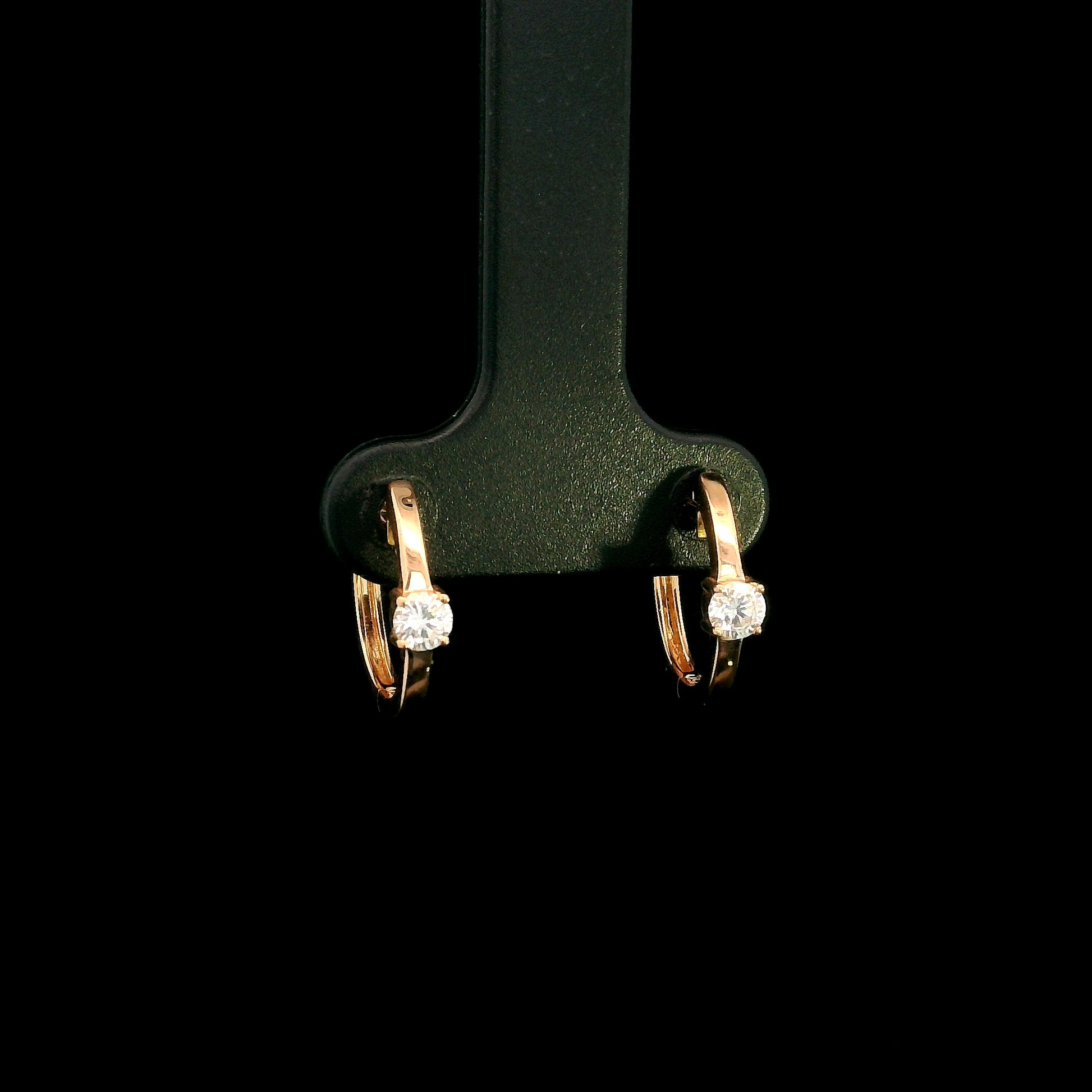 18K rose gold diamond huggie hoop earrings with round solitaire diamonds