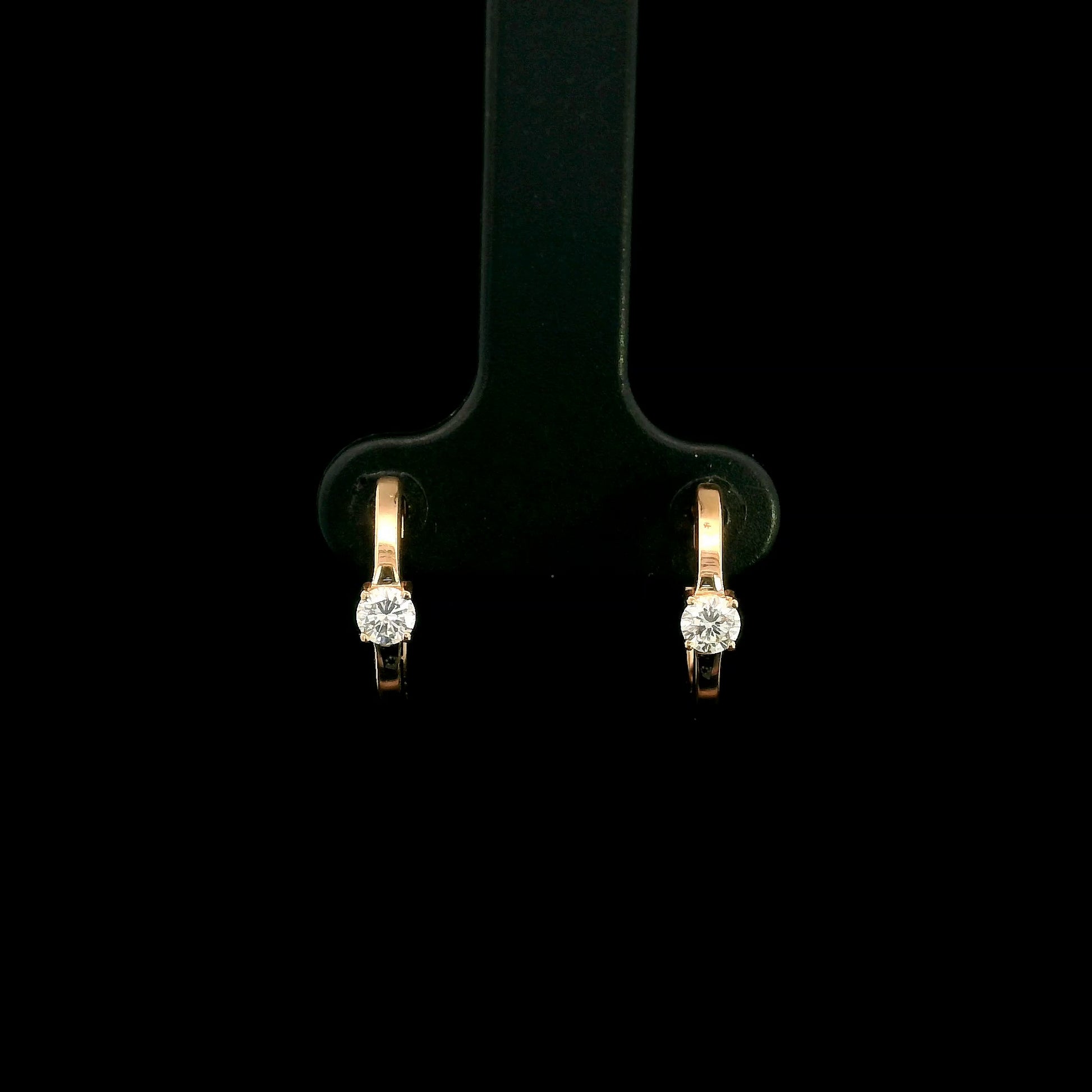 18K rose gold diamond huggie hoop earrings with round solitaire diamonds