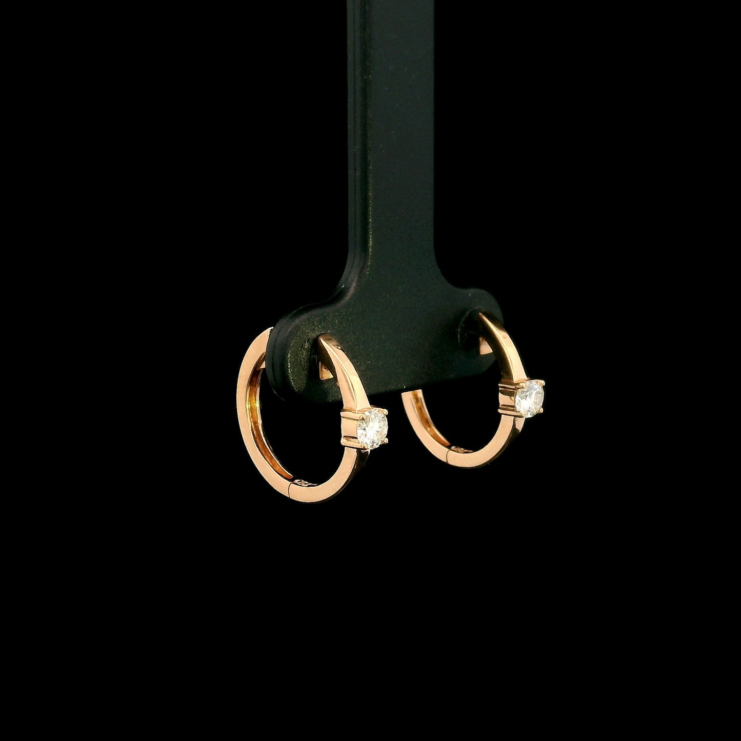18K rose gold diamond huggie hoop earrings with round solitaire diamonds
