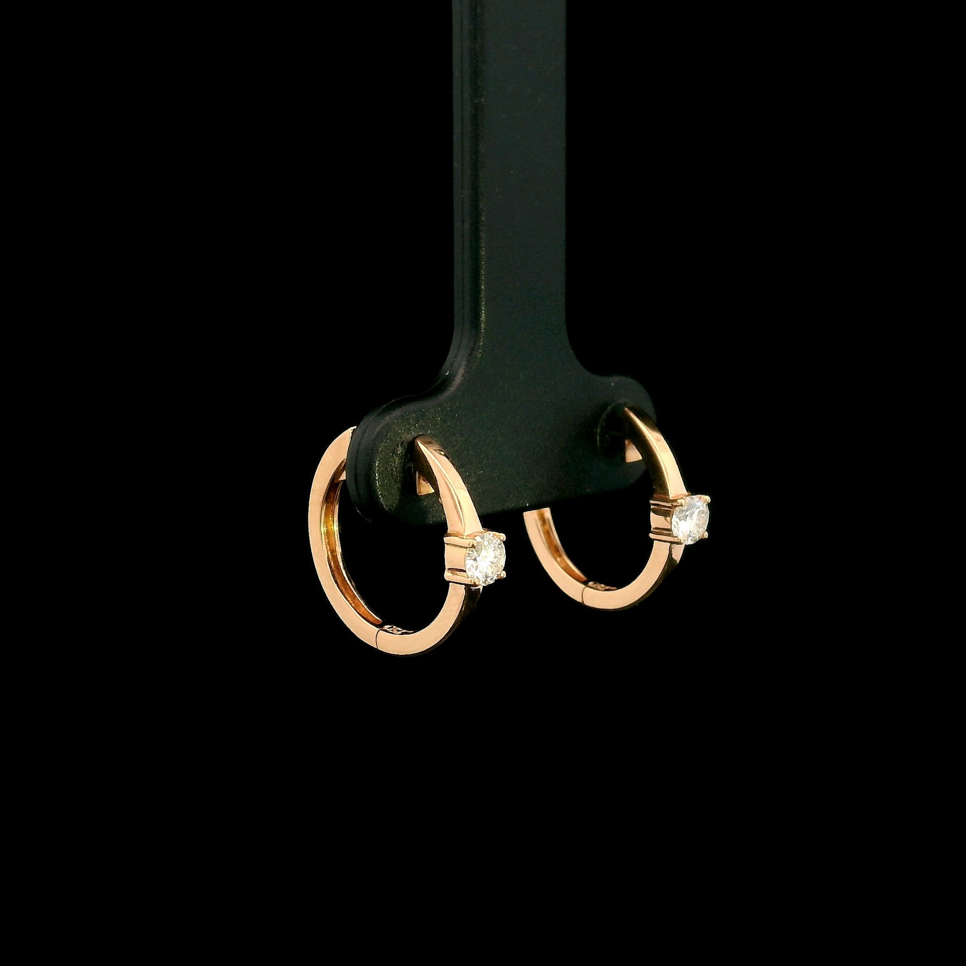 18K rose gold diamond huggie hoop earrings with round solitaire diamonds
