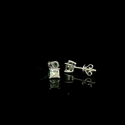 Princess cut diamond stud earrings in 18K white gold with 0.58 carat total natural diamond weight