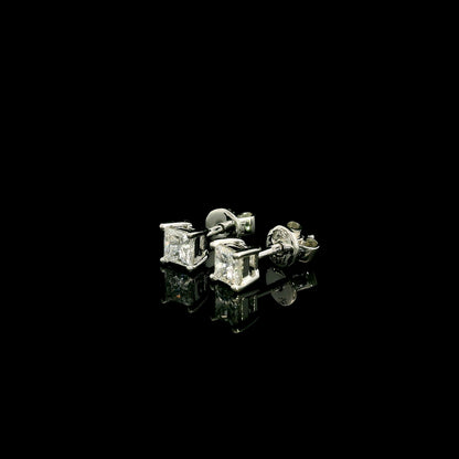 Princess cut diamond stud earrings in 18K white gold with 0.58 carat total natural diamond weight