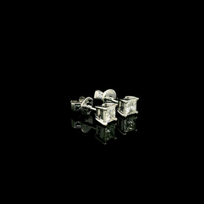 Princess cut diamond stud earrings in 18K white gold with 0.58 carat total natural diamond weight