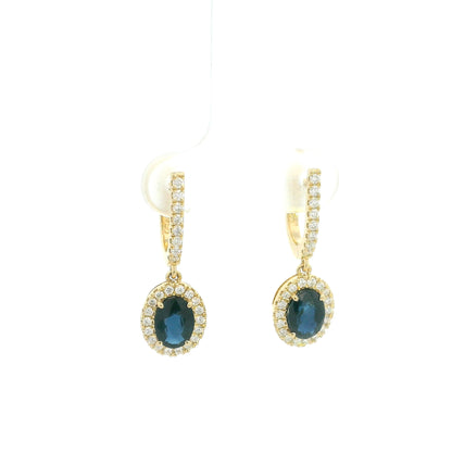 Oval blue sapphire and diamond halo drop earrings in 18K yellow gold with diamond-set hoops