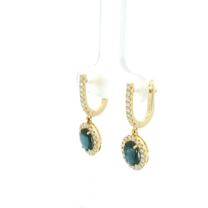 Oval blue sapphire and diamond halo drop earrings in 18K yellow gold with diamond-set hoops