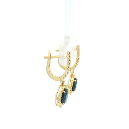 Oval blue sapphire and diamond halo drop earrings in 18K yellow gold with diamond-set hoops
