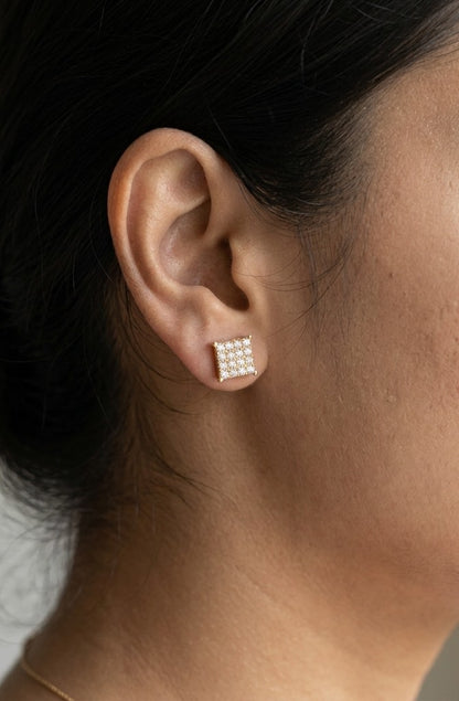 Rectangular diamond cluster stud earrings in 18K yellow gold featuring multiple round brilliant diamonds by Emirates Diamonds.