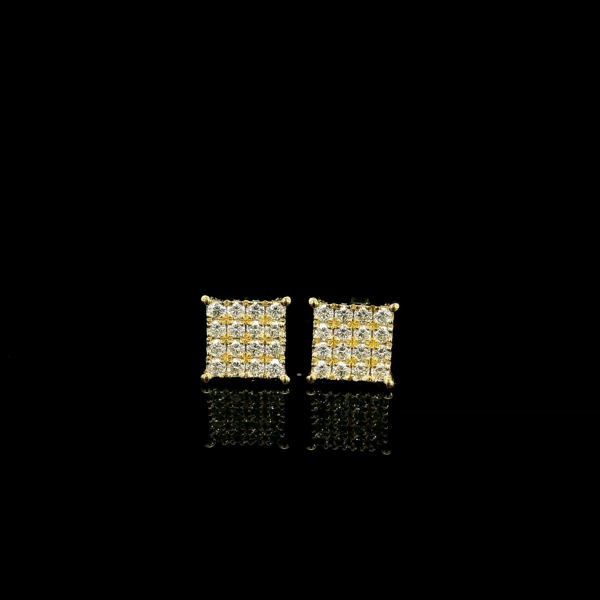 Rectangular diamond cluster stud earrings in 18K yellow gold featuring multiple round brilliant diamonds by Emirates Diamonds.