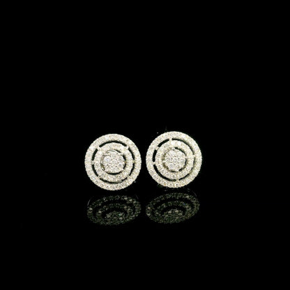 Diamond circle stud earrings in 18K white gold featuring concentric rows of round brilliant diamonds.