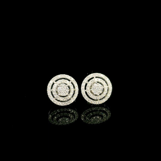 Diamond circle stud earrings in 18K white gold featuring concentric rows of round brilliant diamonds.