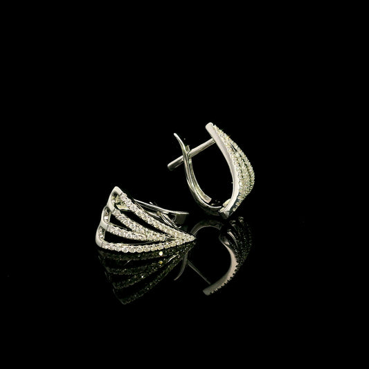 Multi-row diamond hoop earrings in 18K white gold with layered sweeping rows of round brilliant diamonds by Emirates Diamonds.