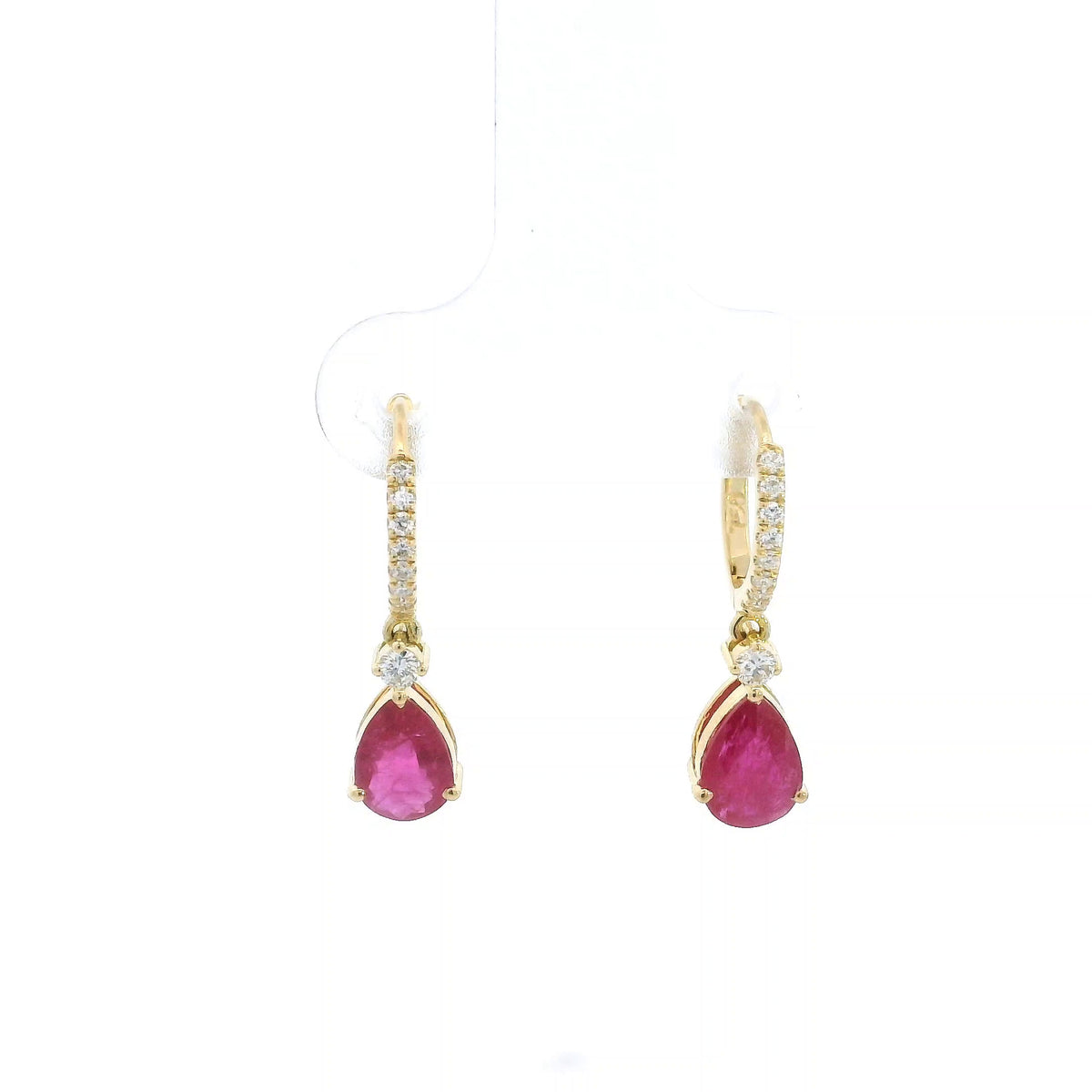 Pear-shaped ruby drop earrings with diamond-set huggie hoops in 18K yellow gold by Emirates Diamonds.