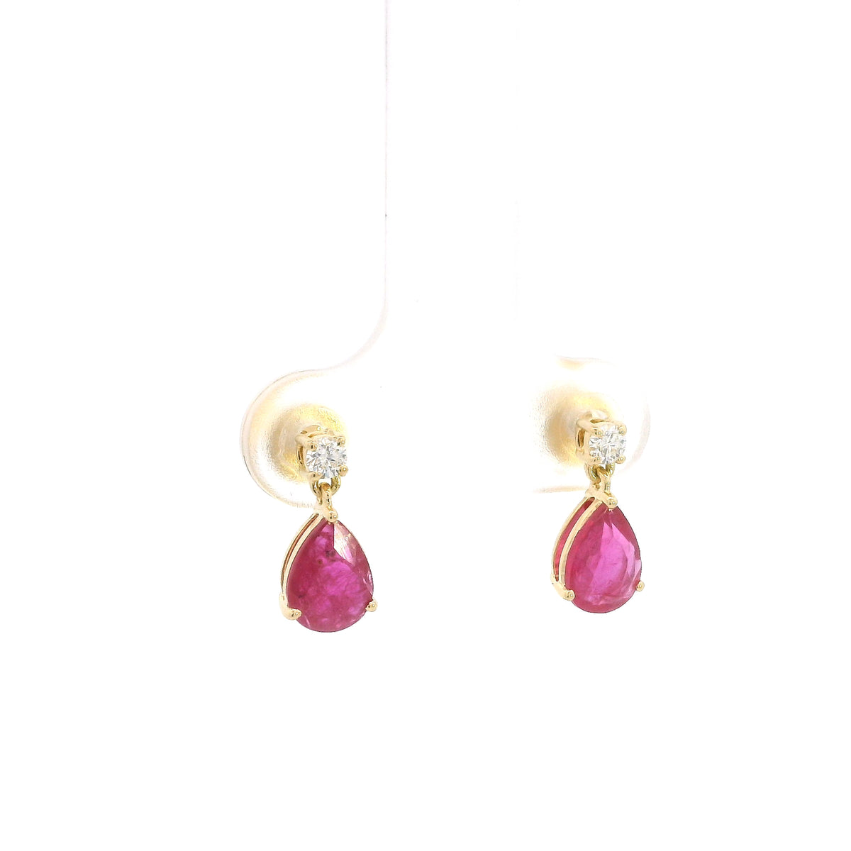 Pear shaped ruby and diamond drop earrings in 18K yellow gold with round diamond accents