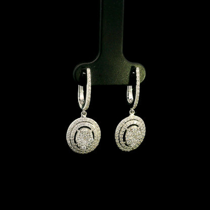 Oval diamond drop earrings in 18K white gold with multi-row diamond design