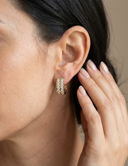 Double row diamond hoop earrings in 18K yellow gold featuring two parallel rows of round brilliant diamonds.