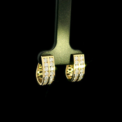 Double row diamond hoop earrings in 18K yellow gold featuring two parallel rows of round brilliant diamonds.