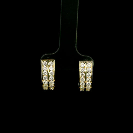 Double row diamond hoop earrings in 18K yellow gold featuring two parallel rows of round brilliant diamonds.
